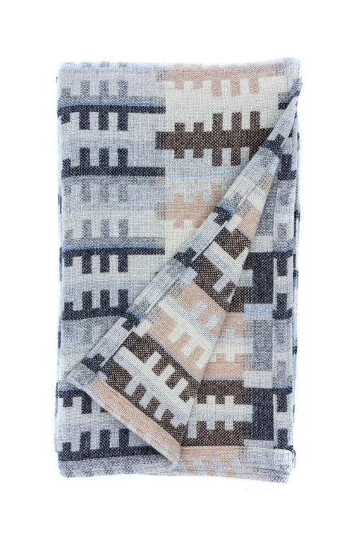 Wool throw with a FOREST woven tree pattern in cream, beige, brown and grey -by Melin Tregwynt