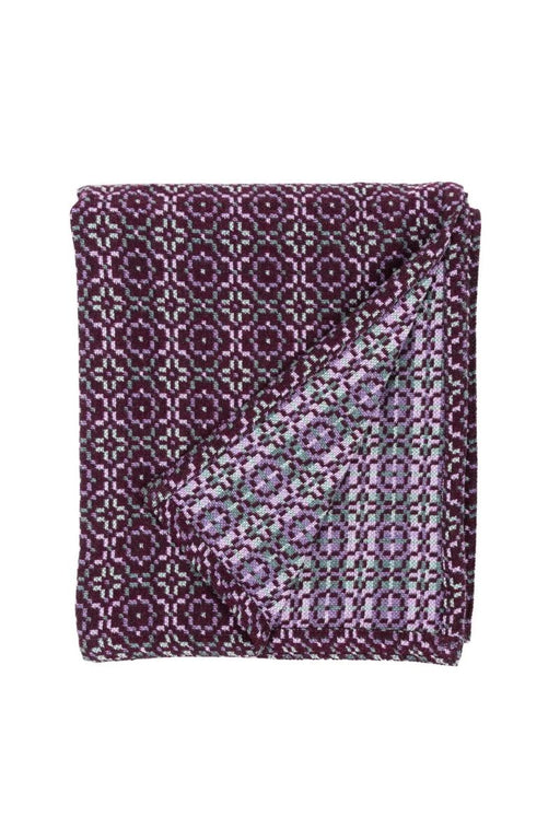 Melin Tregwynt woven wool throw or blanket in dark purple with lilac and grey Vintage Rose pattern repeat