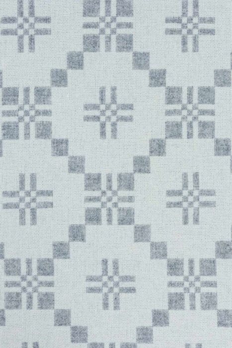 St David's Cross Cushion in White and Silver Grey. Fabric woven and made in South Wales by Melin Tregwynt.