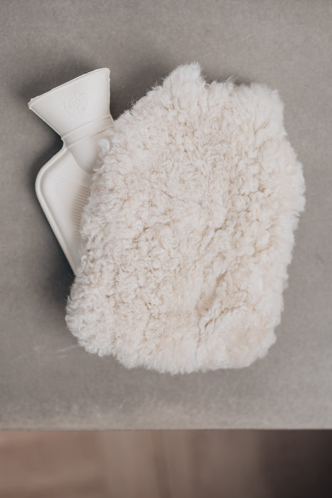 Mini Sheepskin Hot Water Bottle Cover in a soft cotton colour