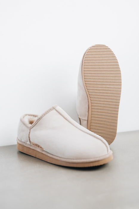 Relaxing Westmorland Sheepskins women’s house slippers in neutral tones with a plush wool interior.