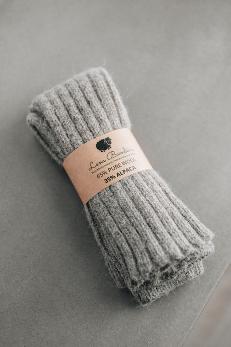 Versatile Lana Bambini leg warmers in a wool-alpaca blend, ideal for staying warm and fashionable