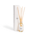 reed diffuser set with clear glass bottle and six reeds, shown with white card Hobo + Co. branded box
