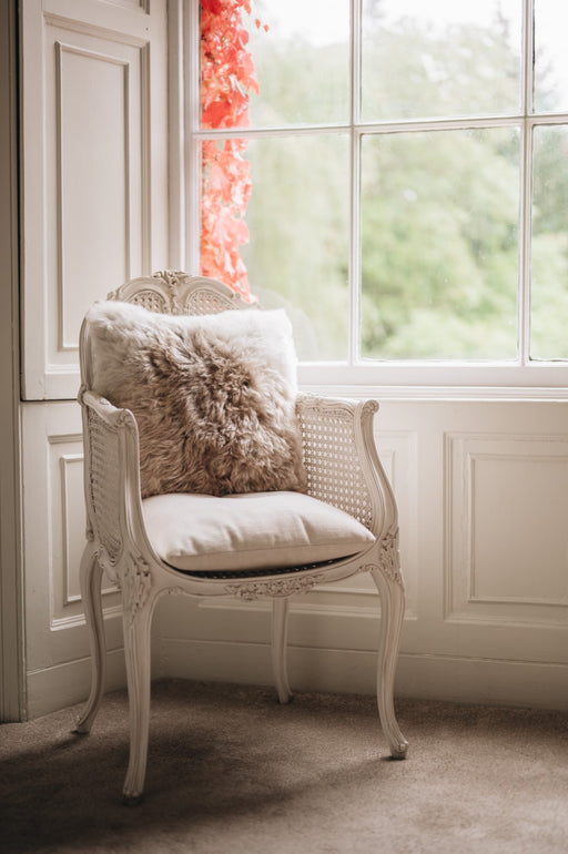 Natural Icelandic sheepskin cushion on chair 