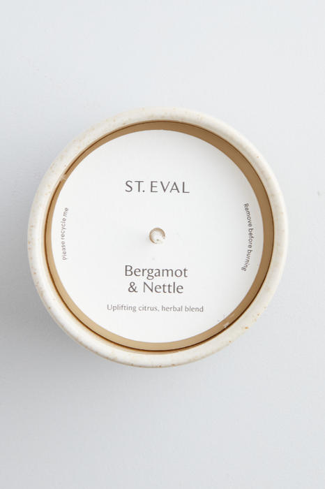 Bergamot & Nettle St. Eval fragranced candle in a sand coloured and inspired ceramic pot 