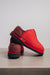 Hard-soled women’s sheepskin slippers with a cosy fleece interior for cold evenings. colour red