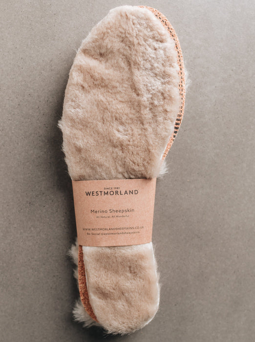 Natural colour Sheepskin Children's Cuttable Insoles. Cut to size. Wrapped in a cardboard informational sleave.